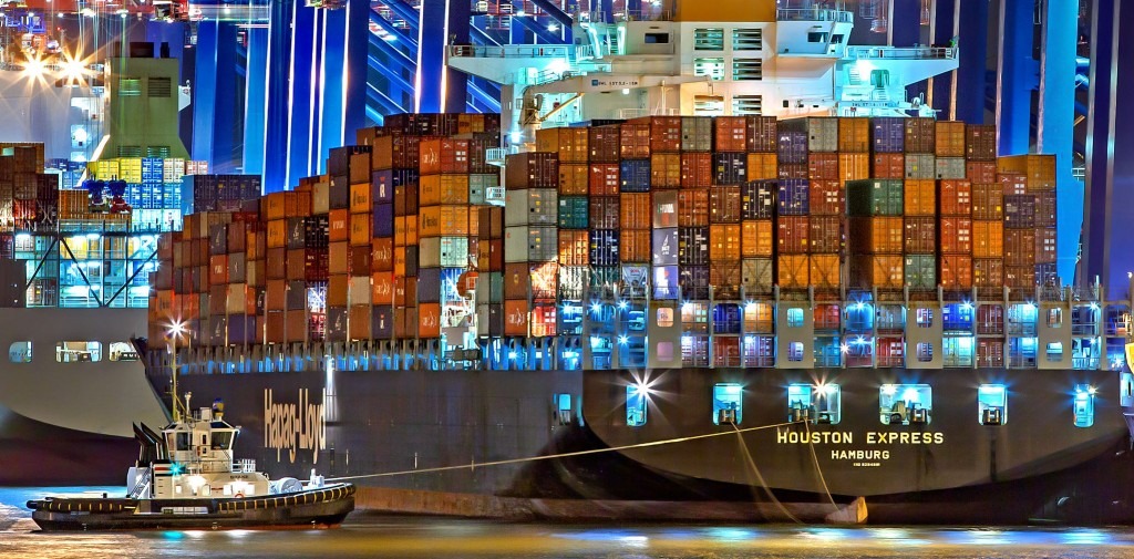 houston express loaded with shipping containers at night